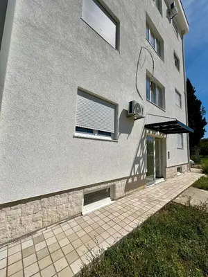 a building with a window and an awning on it at Stex Urban 2 in Podgorica