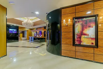 a lobby with a painting on a wall at Luxury 3 bedroom private apt in beachfront Hotel in Budva