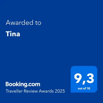 a blue text box with the words awarded to timetime on it at Tina in Cetinje