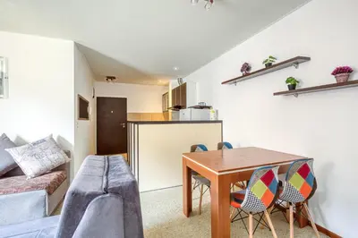 a living room with a table and a couch at Mik Apartments Heart of Budva 1 plus 1 40 SqMeter in Budva
