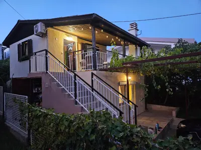 a house with a staircase in front of it at Montebar2 in Brca