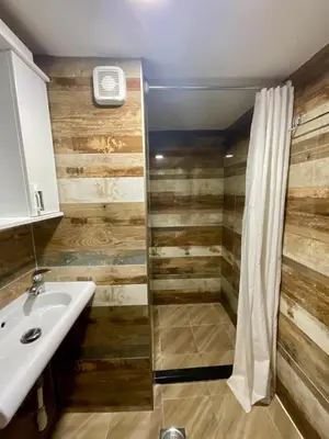 a bathroom with a sink and a shower at sar 5 in Kotor