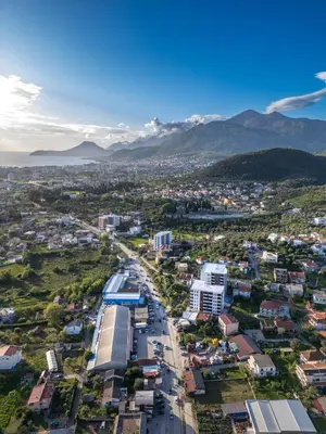 an aerial view of a city with mountains in the background at Apartment BAR M3A sea view in Bar