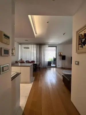 a living room with a kitchen and a dining room at Dukley Retreat, Serenity Collection in Budva