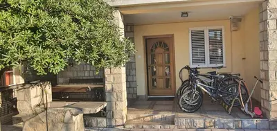 a group of bikes parked in front of a house at Vila Anika in Podgorica