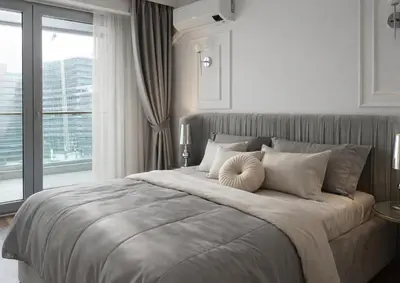 a bedroom with a large bed with a large window at New sea view luxury apartment in center in Budva