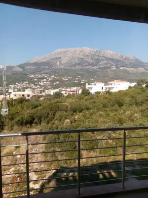 a view of a mountain from a train window at Apartment Sea Space 3 in Dobra Voda
