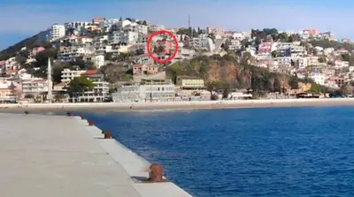 a red circle is sitting on top of a beach at Sea View Apartment - Ulcinj - 40 sqm in Ulcinj