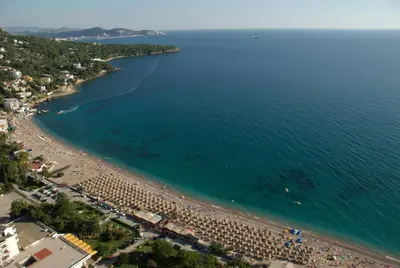 an aerial view of a beach with a group of people at Hotel Sato Conference & SPA Resort in Sutomore