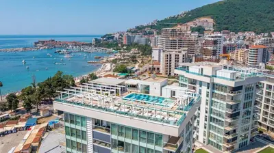 an aerial view of a city and the ocean at Apartment in the luxury hotel near beach in Budva