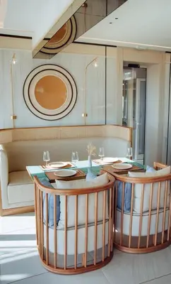 a dining room with a table and a couch at Status-M Apartments 135 in Becici